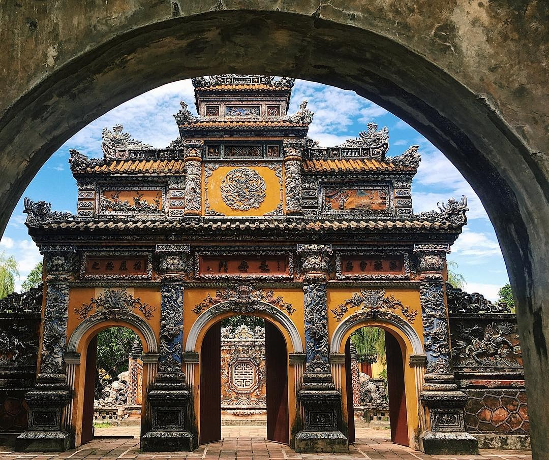 Intricate mosaic archway gate inside Hue Imperial City