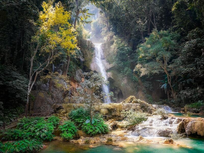 Kuang Si Falls cascading into turquoise pools in Luang Prabang