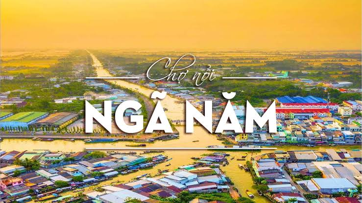 Panoramic aerial view of Nga Nam floating market intersection in Soc Trang
